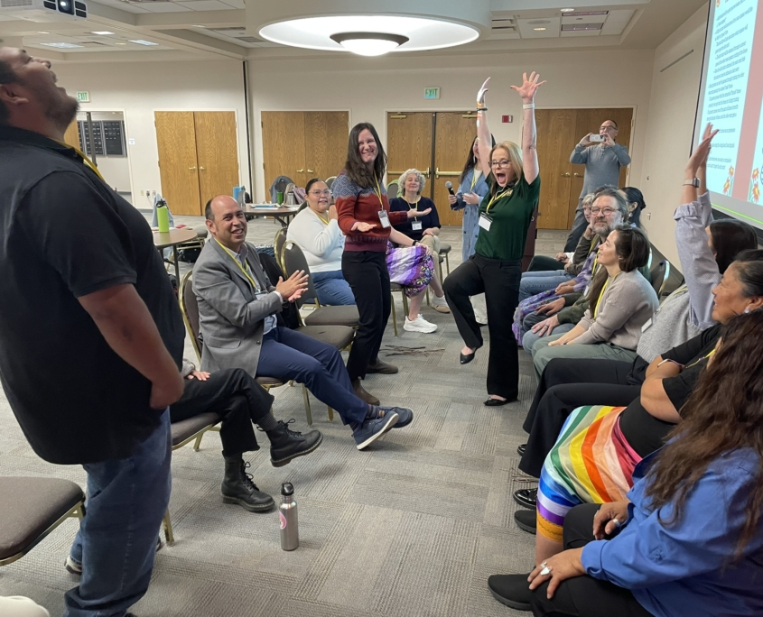 CIRCLES Alliance team members playing a handgame during the fall 2025 Gathering